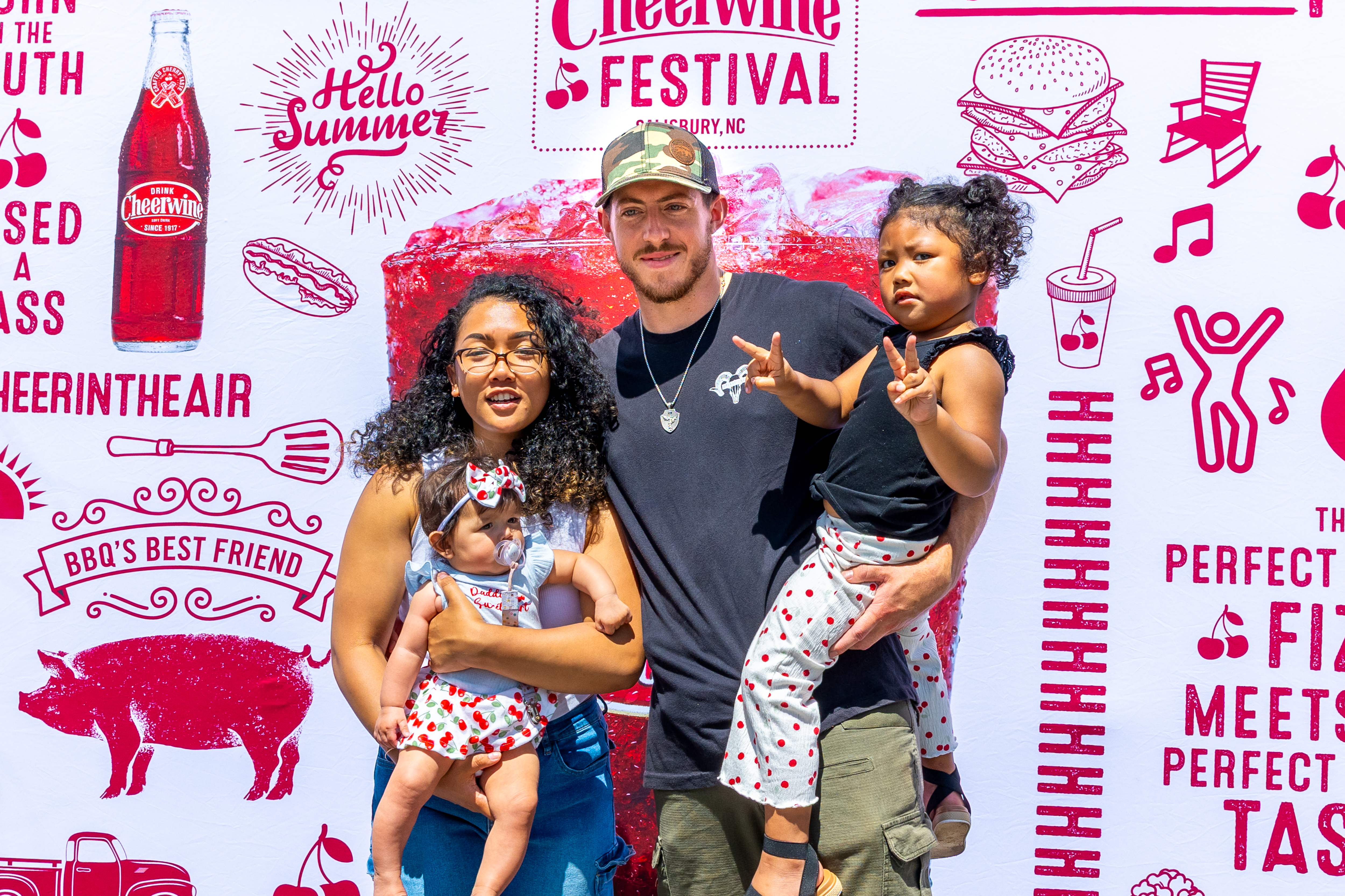 Family at Cheerwine Festival backdrop